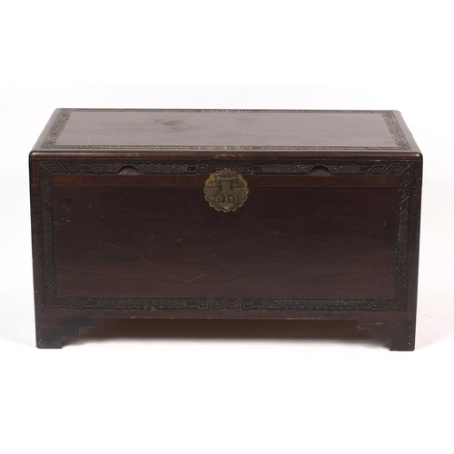 18 - Chinese camphorwood trunk with carved decoration, 55cm H x 101cm W x 50cm D
