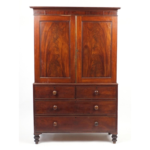 6 - Mahogany linen press, fitted a pair of doors enclosing four sliding shelves above four drawers, 198c... 