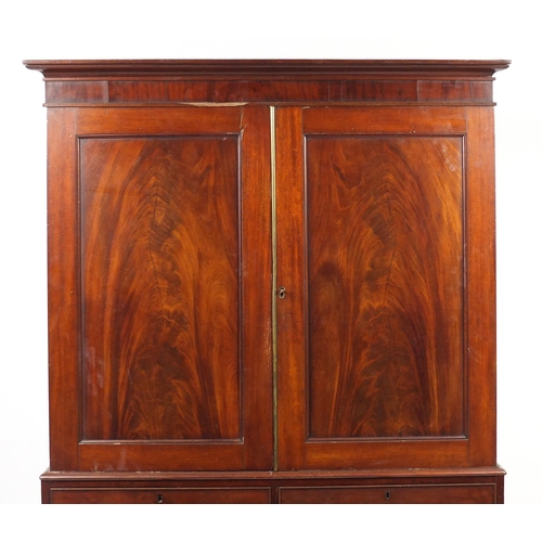 6 - Mahogany linen press, fitted a pair of doors enclosing four sliding shelves above four drawers, 198c... 
