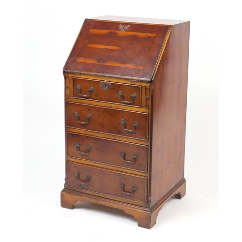 86 - Yew bureau, the fall enclosing a fitted interior above four drawers, 100cm high x 51cm wide x 46cm d... 