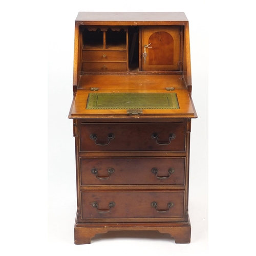 86 - Yew bureau, the fall enclosing a fitted interior above four drawers, 100cm high x 51cm wide x 46cm d... 