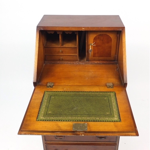 86 - Yew bureau, the fall enclosing a fitted interior above four drawers, 100cm high x 51cm wide x 46cm d... 