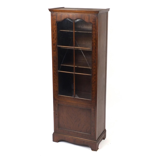 57 - Mahogany bookcase fitted with two adjustable shelves above a cupboard base, 165cm high x 60cm wide x... 