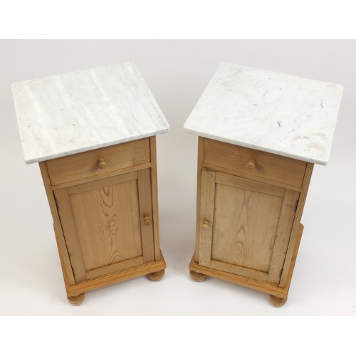 2038 - Pair of pine night stands each with marble top above a drawer and cupboard door, 81cm H x 42cm W x 3... 
