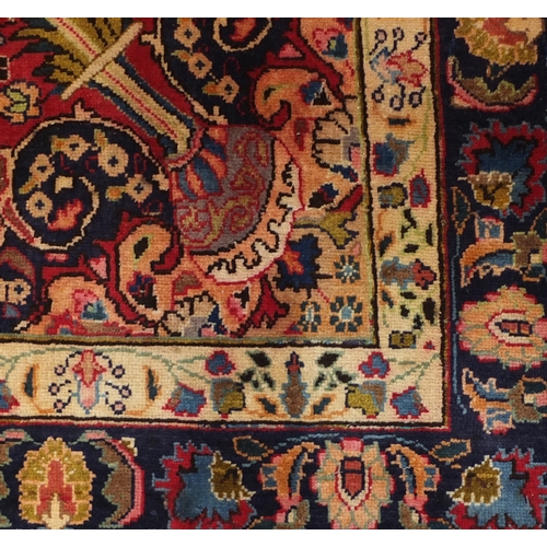 2008A - Red ground Hamadan rug, with floral decoration 158cm x 132cm