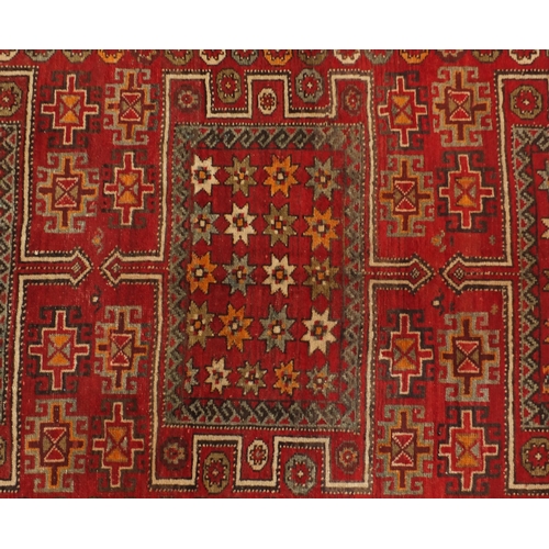 2016A - Red ground Baluchi carpet runner, with geometric design 259cm x 98cm