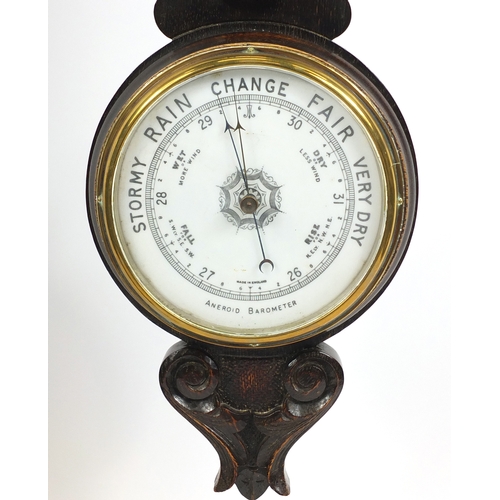 212 - Oak aneroid barometer, 78cm in length