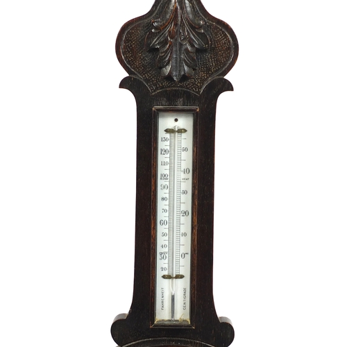 212 - Oak aneroid barometer, 78cm in length