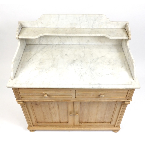 2037 - Pine wash stand with marble top above two drawers and a pair of cupboard doors, 112cm H x 100cm W 55... 