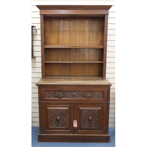43 - Oak bookcase with three shelves above a secretaire  drawer and a pair of cupboard doors, 224cm H x 1... 
