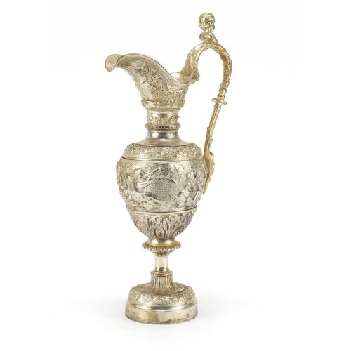 198 - Silver plated wine ewer, cast with grape vines and putti, 36.5cm high