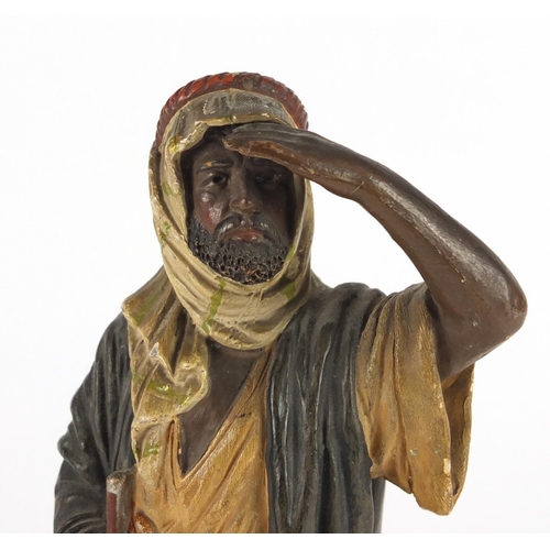 162 - Terracotta figure of an Arab hunter, 22cm high