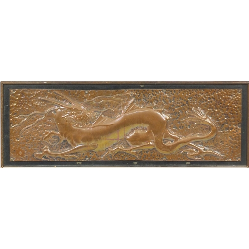 110 - Arts & Crafts Keswick style copper panel embossed with a dragon, framed, 90cm x 28.5cm