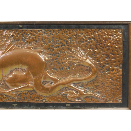 110 - Arts & Crafts Keswick style copper panel embossed with a dragon, framed, 90cm x 28.5cm