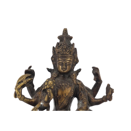 172 - Chino Tibetan bronze figure of Buddha, 21.5cm high