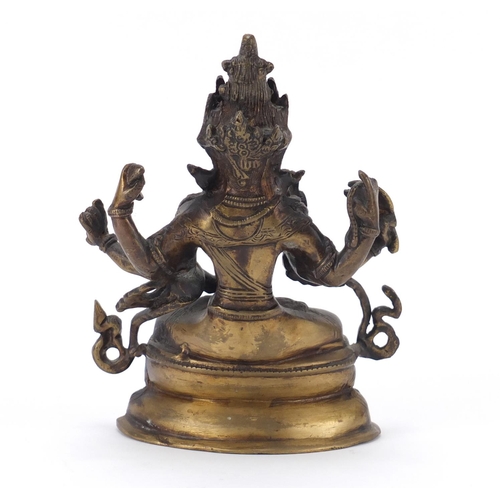 172 - Chino Tibetan bronze figure of Buddha, 21.5cm high