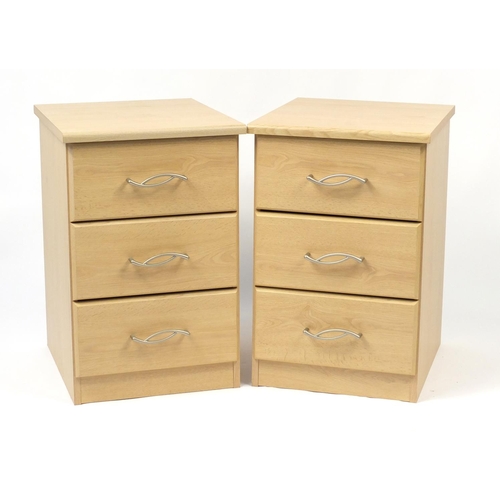 22 - Pair of lightwood three drawer bedside chests, 64cm H x 42cm W x 51cm D