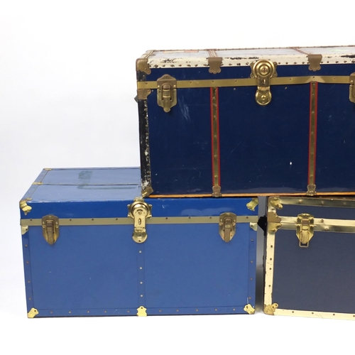 39 - Three large metal bound travelling trunks, the largest 52cm H x 92cm W x 51cm D