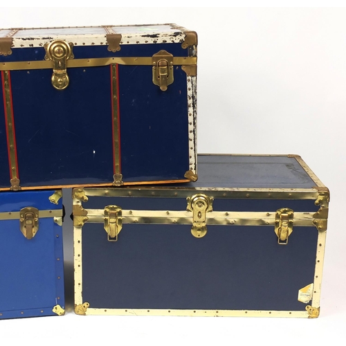 39 - Three large metal bound travelling trunks, the largest 52cm H x 92cm W x 51cm D