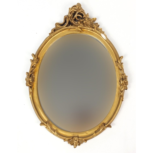 88 - Oval gilt framed wall hanging mirror, 66cm x 46cm