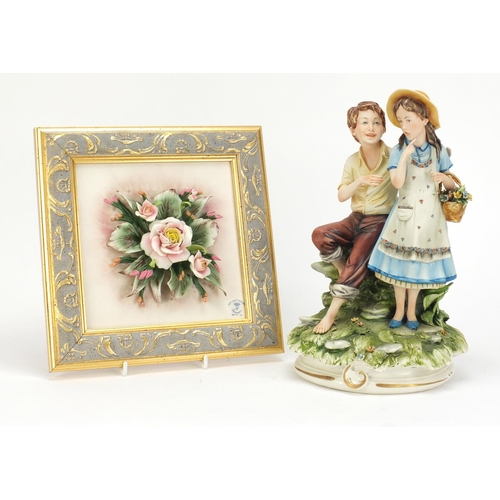 170 - Capo-di-Monte figure group of a young boy and girl and a wall hanging plaque, the figure 27cm high