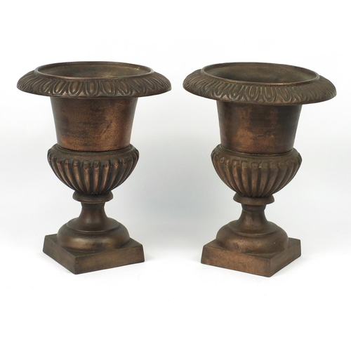13 - Pair of coppered cast iron campana urn planters, 37cm high