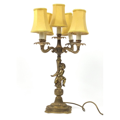 131 - Gilt brass five branch cherub table lamp with shades, 58cm high