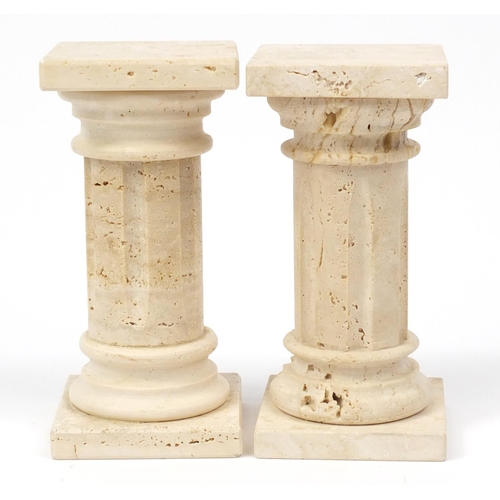 217 - Pair of Roman style carved stone columns, 17cm high