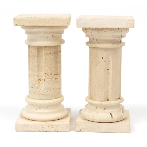 217 - Pair of Roman style carved stone columns, 17cm high