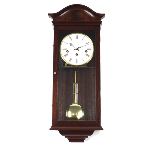 76 - Comitti mahogany cased wall hanging clock with Westminster chime, 55cm in length