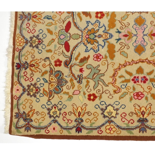 7 - Cream ground rug with all over floral design, 240cm x 170cm