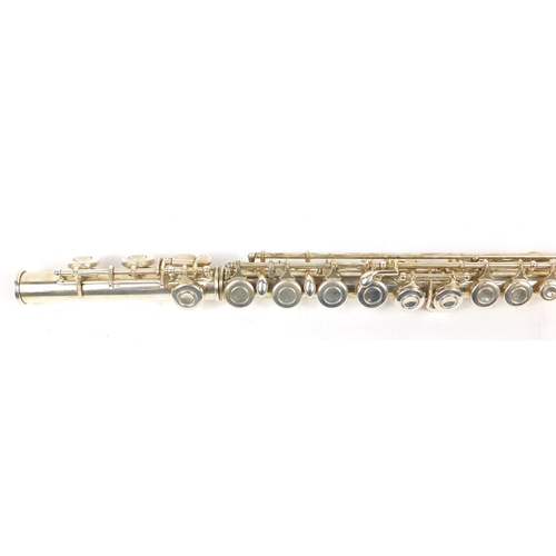 142 - Silver plated three piece Milano flute housed in a fitted case