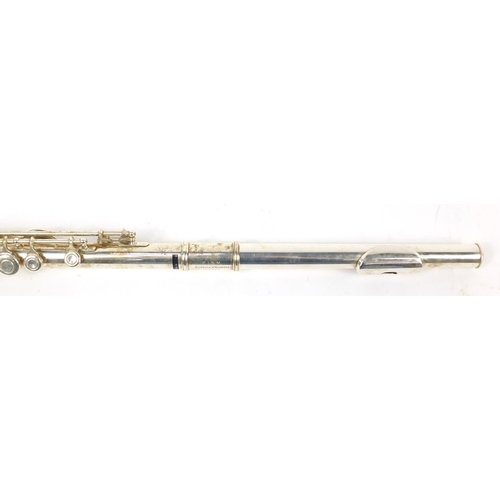 142 - Silver plated three piece Milano flute housed in a fitted case