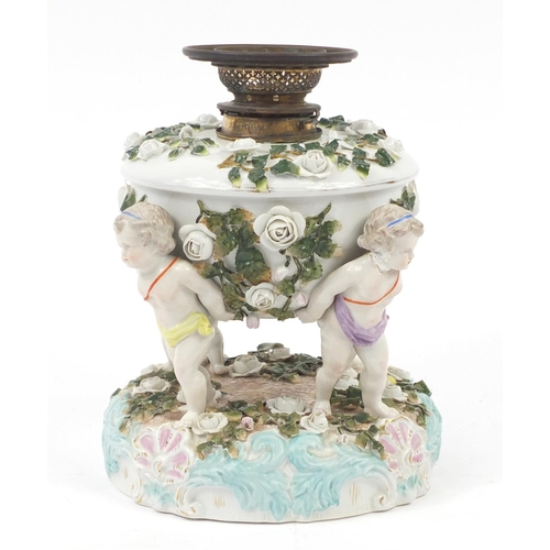 133 - 19th Century Switzendorf porcelain oil lamp base, mounted with three putti, 28cm high