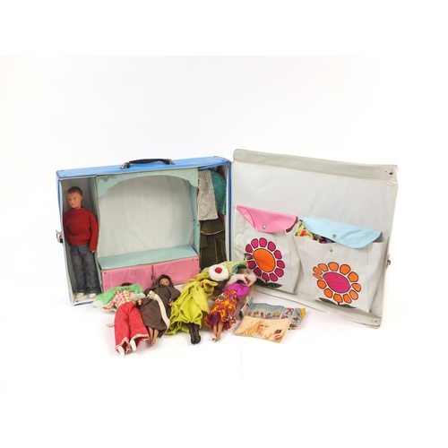 229 - The World of Barbie double doll case including vintage dolls and clothes