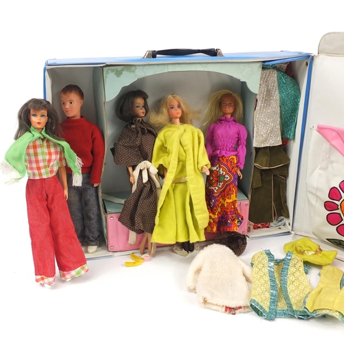 229 - The World of Barbie double doll case including vintage dolls and clothes