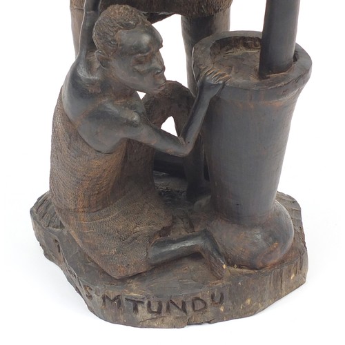 87 - African tribal carving of a father and son, 72cm high