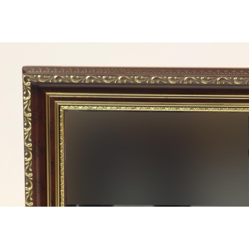 92 - Rectangular gilt framed wall hanging mirror with bevelled glass, 100cm x 70cm