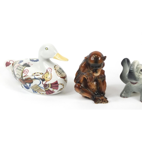 226 - China animals including Winstanley seated cat and a Goebel monkey, the largest 21cm high