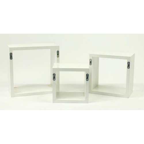 62 - Graduated set of three contemporary wall pockets, the largest 30cm H x 30cm W x 15cm D