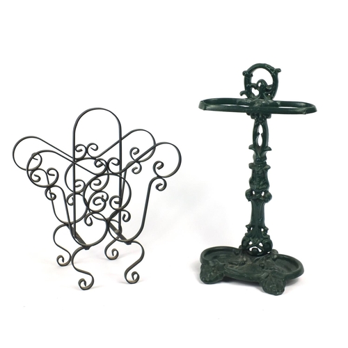 72 - Victorian style cast iron stick stand and a magazine rack, the larger 55cm high