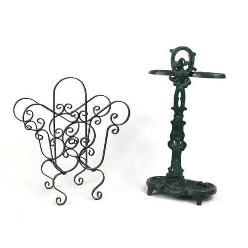 72 - Victorian style cast iron stick stand and a magazine rack, the larger 55cm high