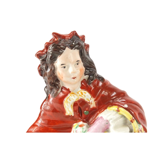 102 - Two Staffordshire Red Riding Hood figures and a God Speed the Plough loving cup, the largest 26cm hi... 