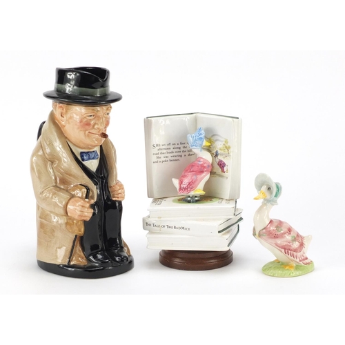 132 - Royal Doulton Winston Churchill Toby jug, Beatrix Potter musical Jemima Puddle-Duck and a Royal Albe... 