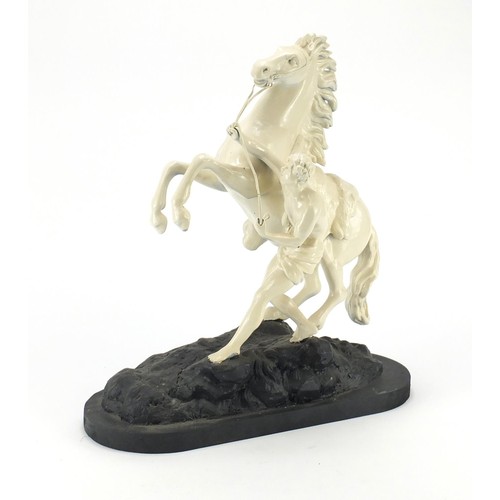 134 - Painted Spelter model of a Marley horse and trainer, 41cm high