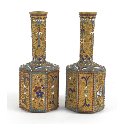 155 - Two Chinese enamel vases decorated with flowers, each 15.5cm high