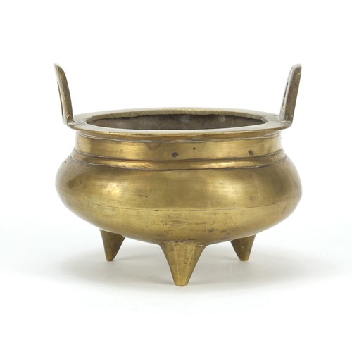 151 - Chinese bronze incense burner with twin handles, character marks to the base, 12cm in diameter