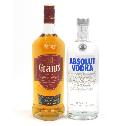 209 - 1L Bottle of Absolute Vodka and 1L bottle of Grants whiskey