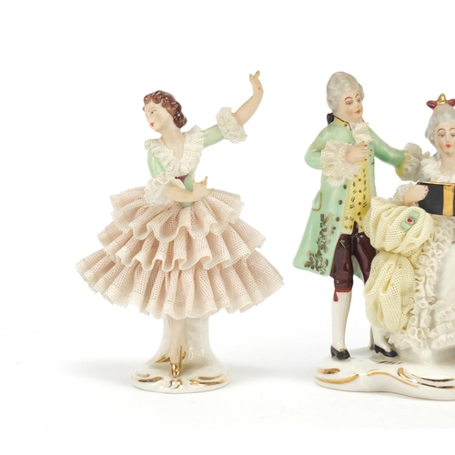 2167 - Three German porcelain lace figurines by Dresden, the largest 13cm high