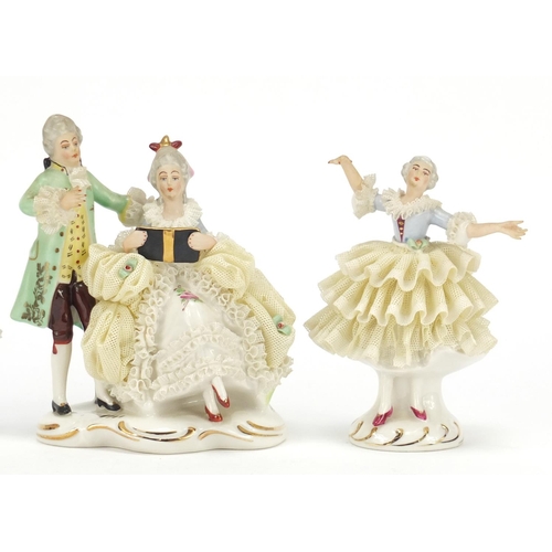 2167 - Three German porcelain lace figurines by Dresden, the largest 13cm high